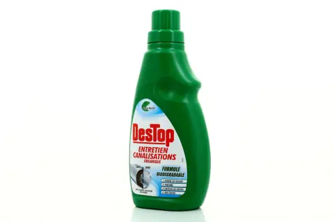 Bouteille verte de Destop Entretien Canalisations Organique, formule biodégradable. Est-ce que le Destop abîme les canalisations ? Ce produit est conçu pour les entretenir.