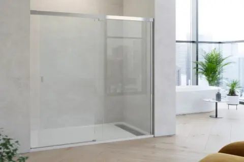 Douche moderne avec paroi vitré. Idéal pour enlever le calcaire de la douche et garder votre salle de bain impeccable.