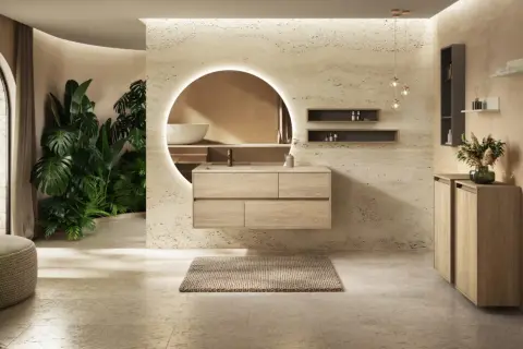 Salle de bain moderne avec plantes luxuriantes, meuble vasque en bois flottant et miroir rond lumineux. Idées pour comment décorer une salle de bain avec une touche naturelle.